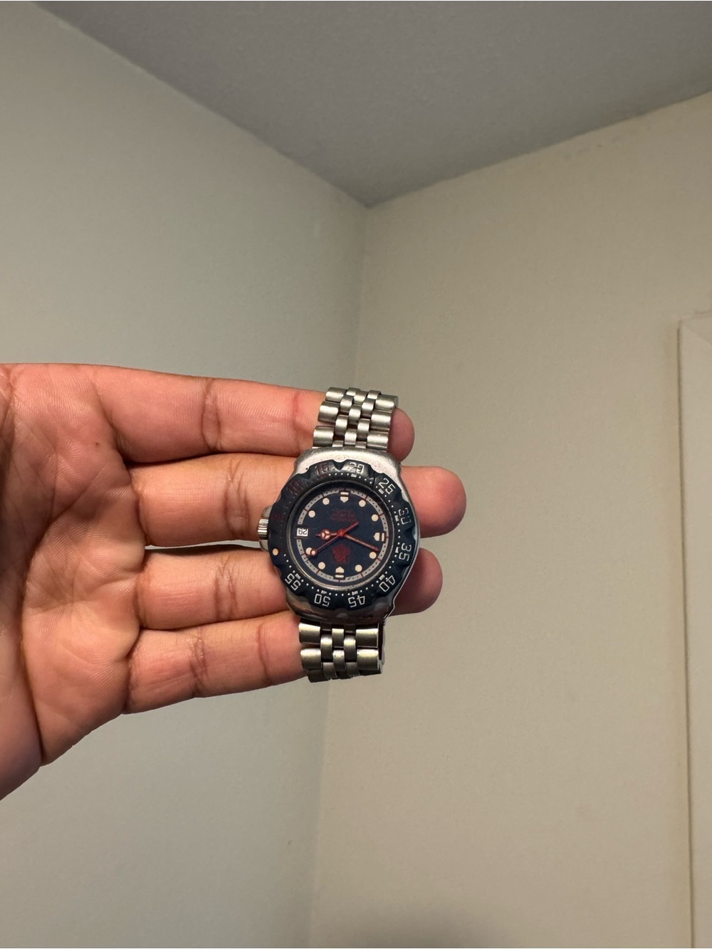 Tag Heuer Men's Watch – Black Dial with Red Accents and Silver Bracelet